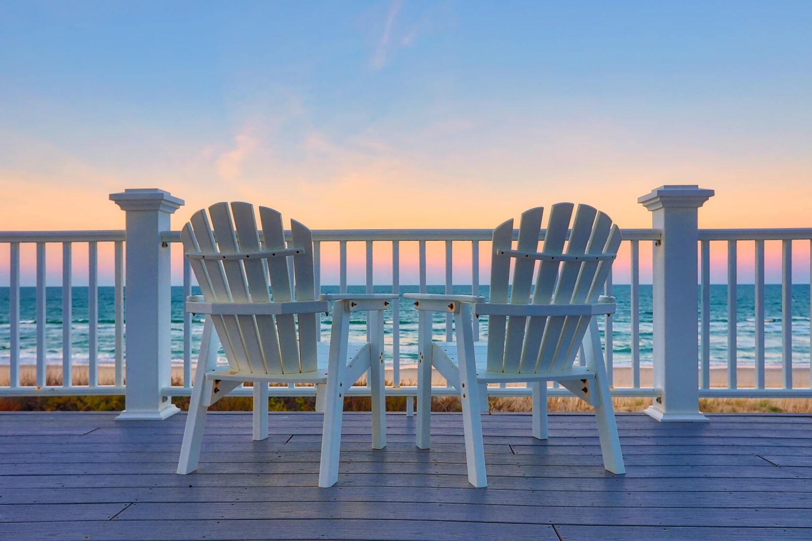 Chairs overlooking the beach at a waterfront home in Florida